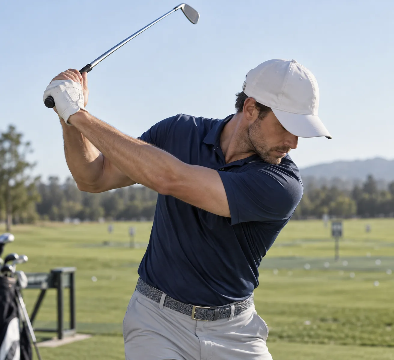 Create a photorealistic instructional golf scene showing a golfer’s lead arm in a correctly pitched position during the backswing, elbow softly bent a...